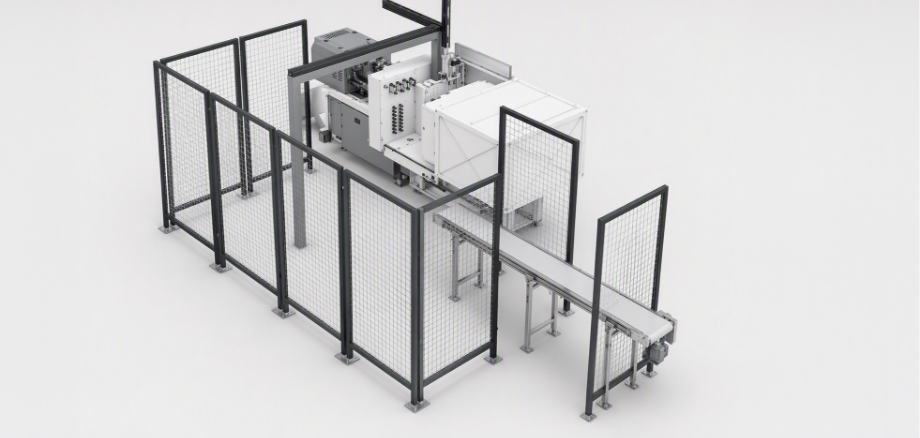 Eingehauste Spritzgussautomation ohne nachgelagerter Förderstrecke für den Materialtransport ohne durchgängige Prozessintegration.